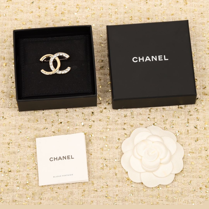 Ch*el brooches